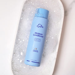 Esalon Moisture Shampoo paired with conditioner for hydration.