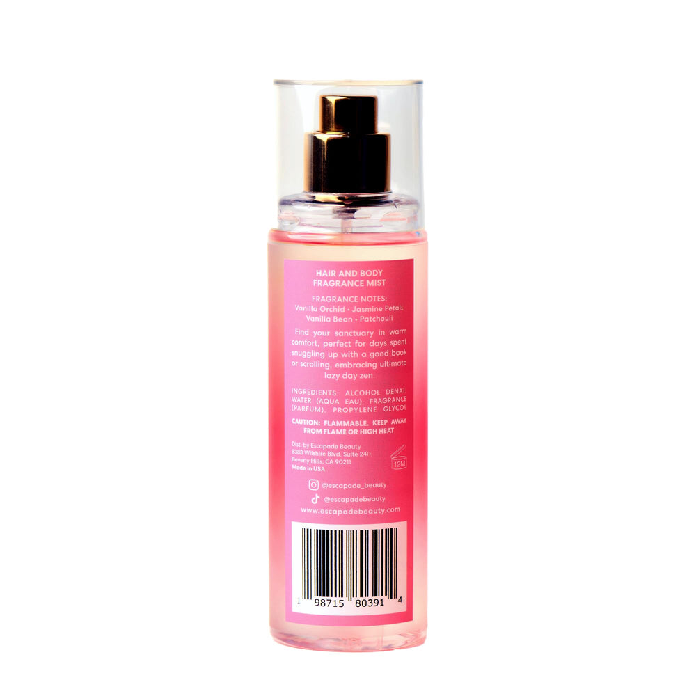 ESCAPADE BEAUTY Cozy Up fragrance bottle closeup — notes mingle softly for light, uplifting fragrance.