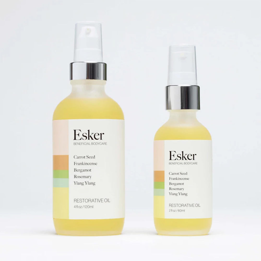 ESKER Restorative Body Oil aroma close-up with woody-herbal notes for a calming mood.