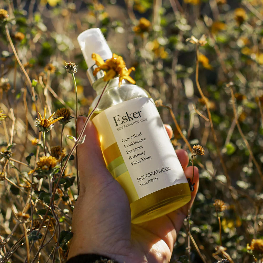 ESKER Restorative Body Oil packaging display on vanity