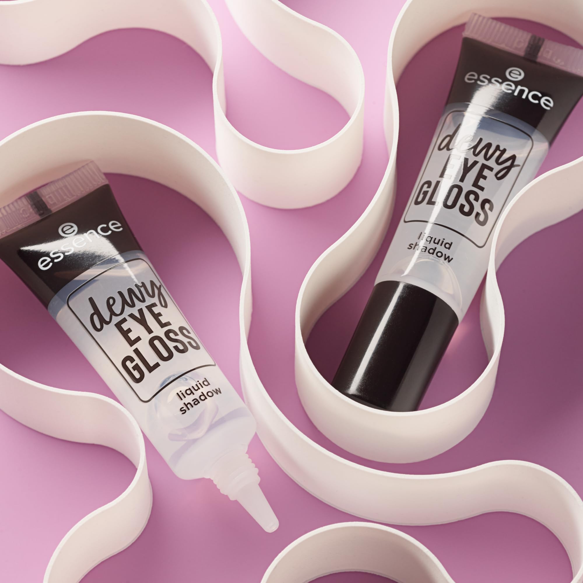 Essence Dewy EYE GLOSS packaging and Made in Italy badge enhances premium appeal.