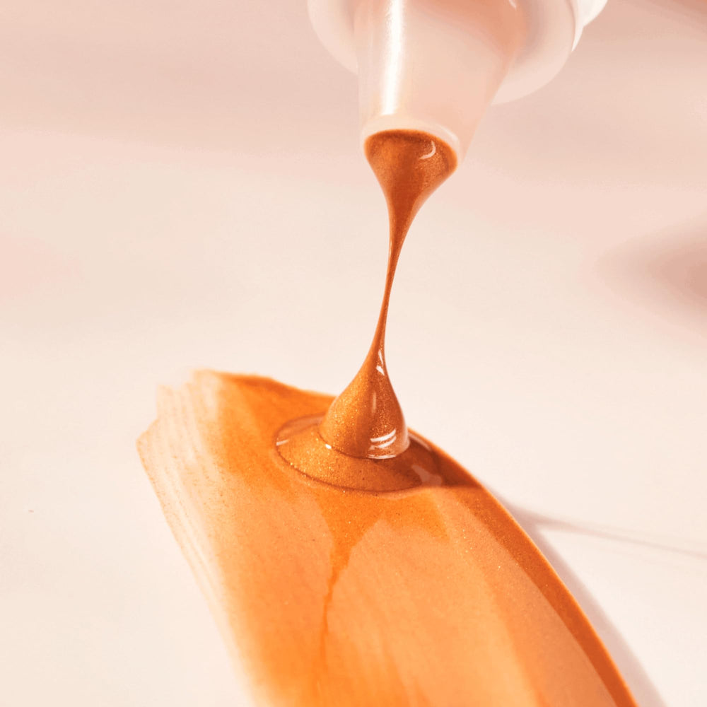 essence Drop of Sunshine bronzing drops vegan cruelty-free emblem indicating ethical formula
