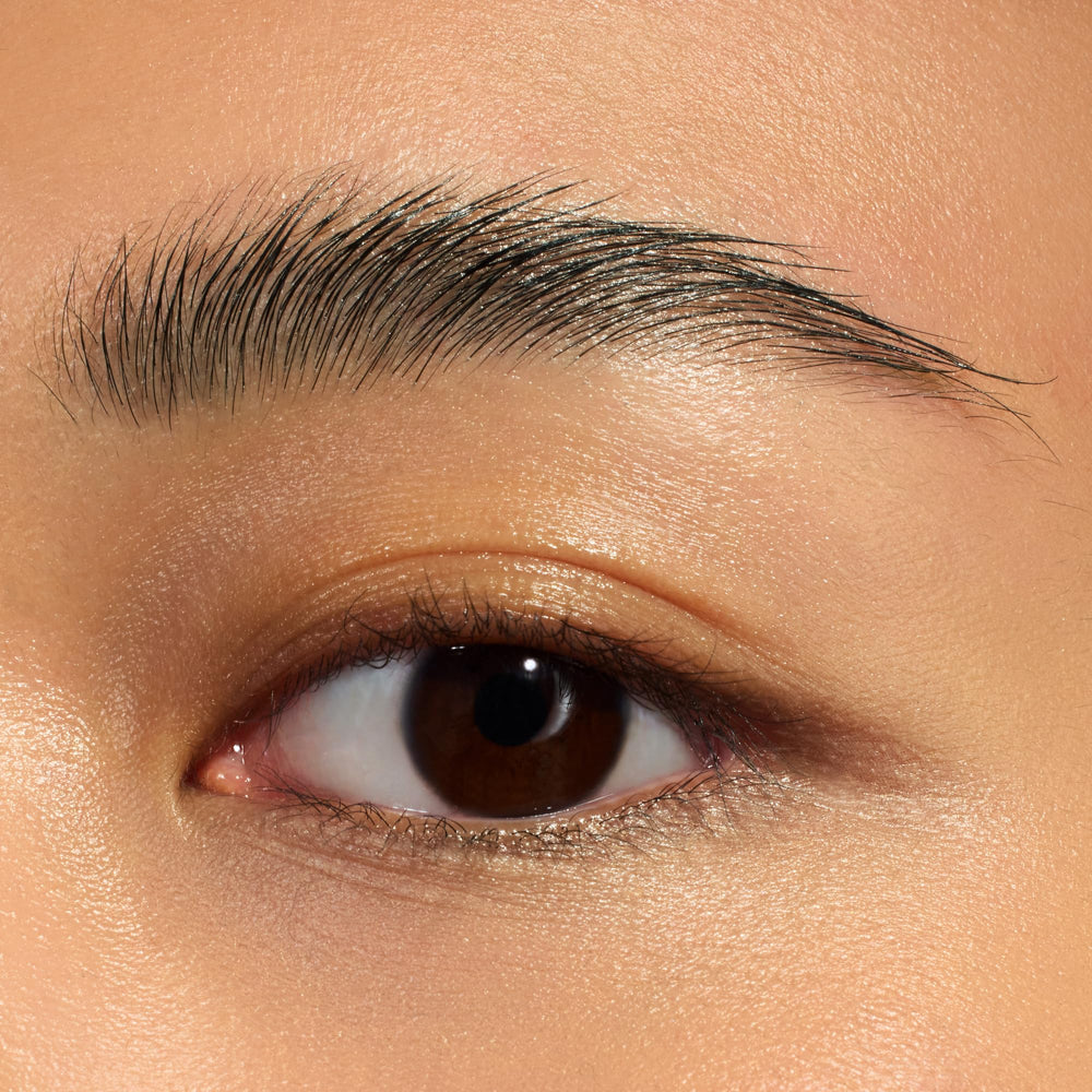 Essence Fix It Like a Pro Brow Gel vegan and cruelty-free badge on the bottle.