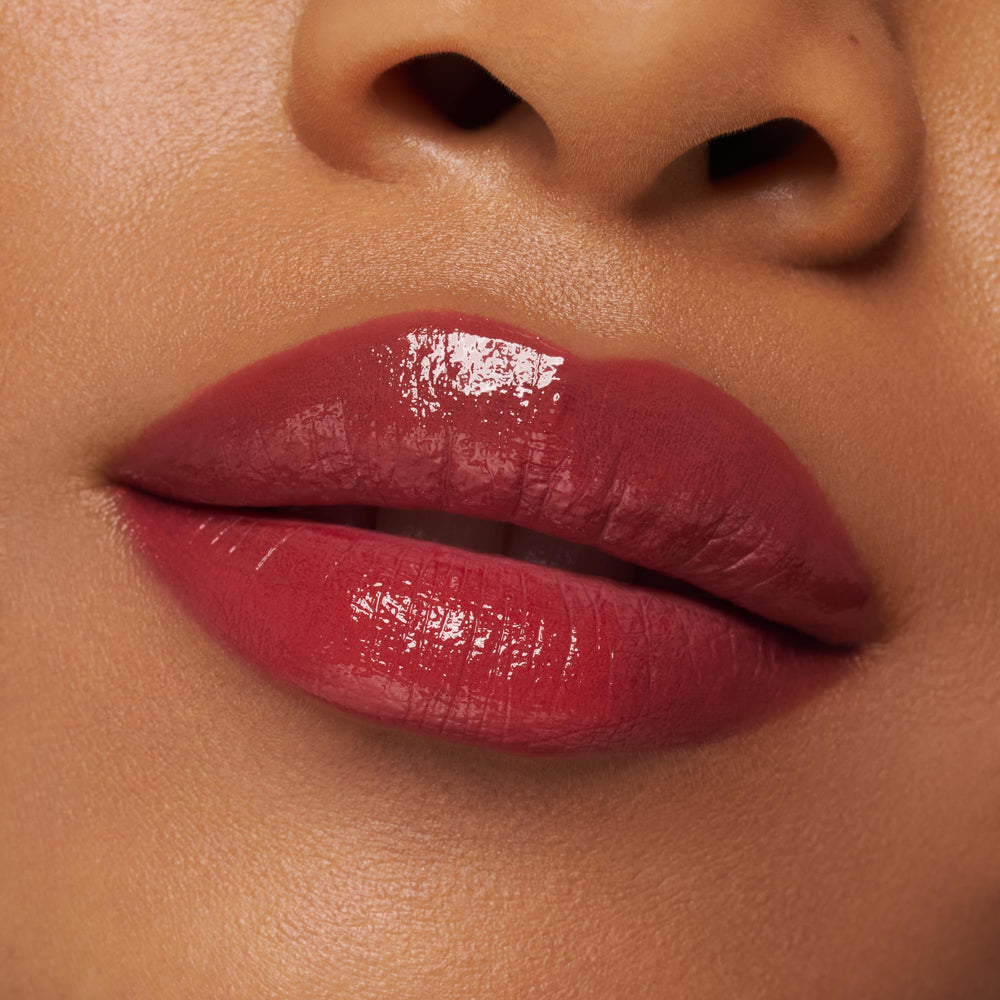 Hydra Kiss Lip Tint applied on lips for a nude-glow look