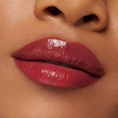Hydra Kiss Lip Tint applied on lips for a nude-glow look