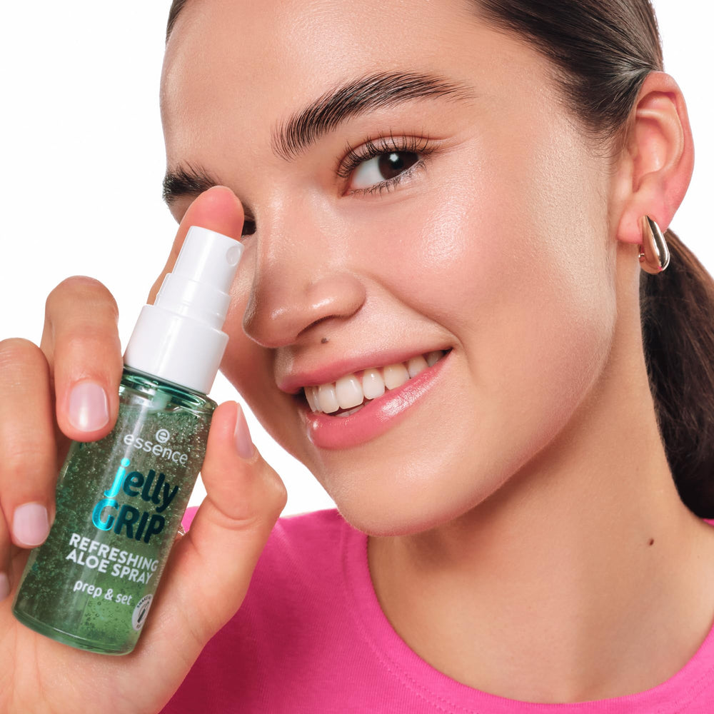 essence Jelly Grip Aloe Spray on cheek delivers refreshing glow and makeup stay.