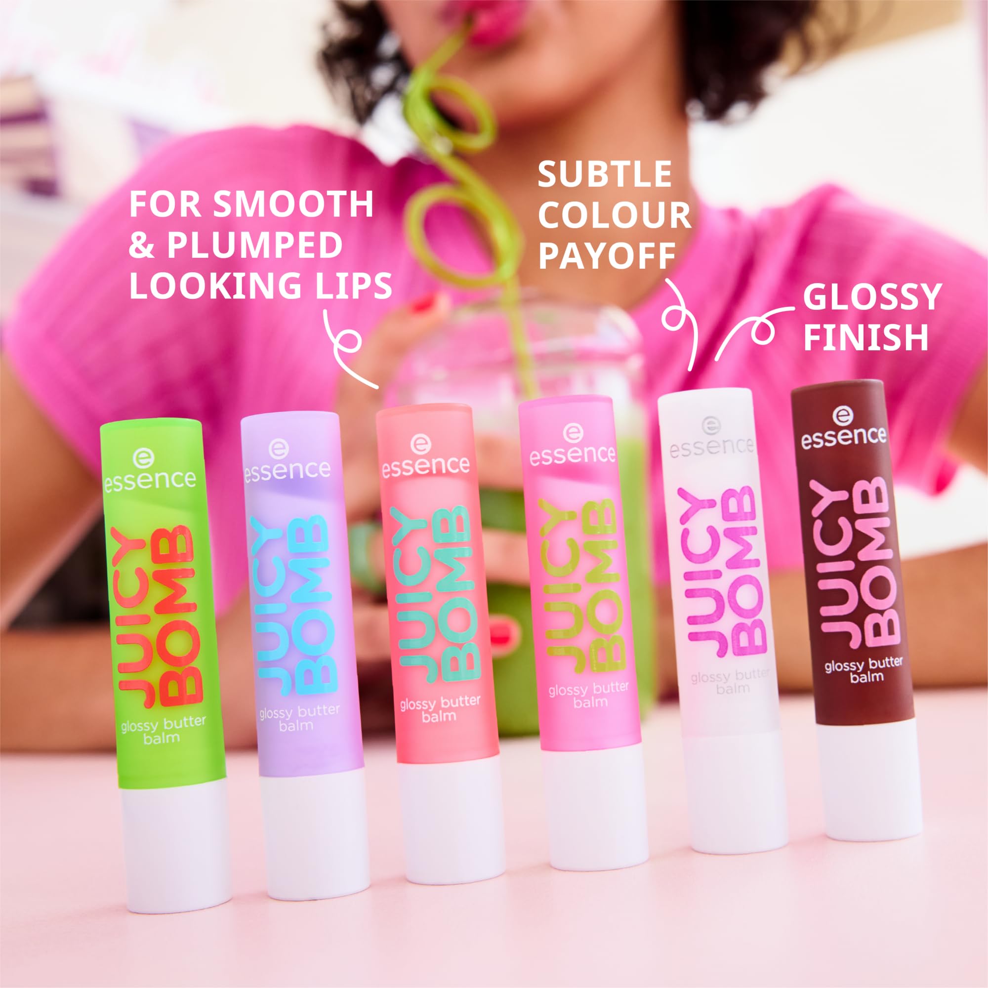 Essence Juicy Butter Balm Oh So Cute swatch on lips with lilac tint.