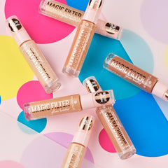 essence Magic Filter Glow Booster skin-tone swatch demonstrates luminous natural finish.