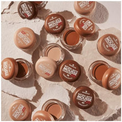 Swatch on hand reveals buildable coverage with a natural matte look by Essence Mousse.