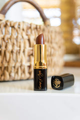 Essence Of Argan lips after application with moisturized, fuller-looking finish