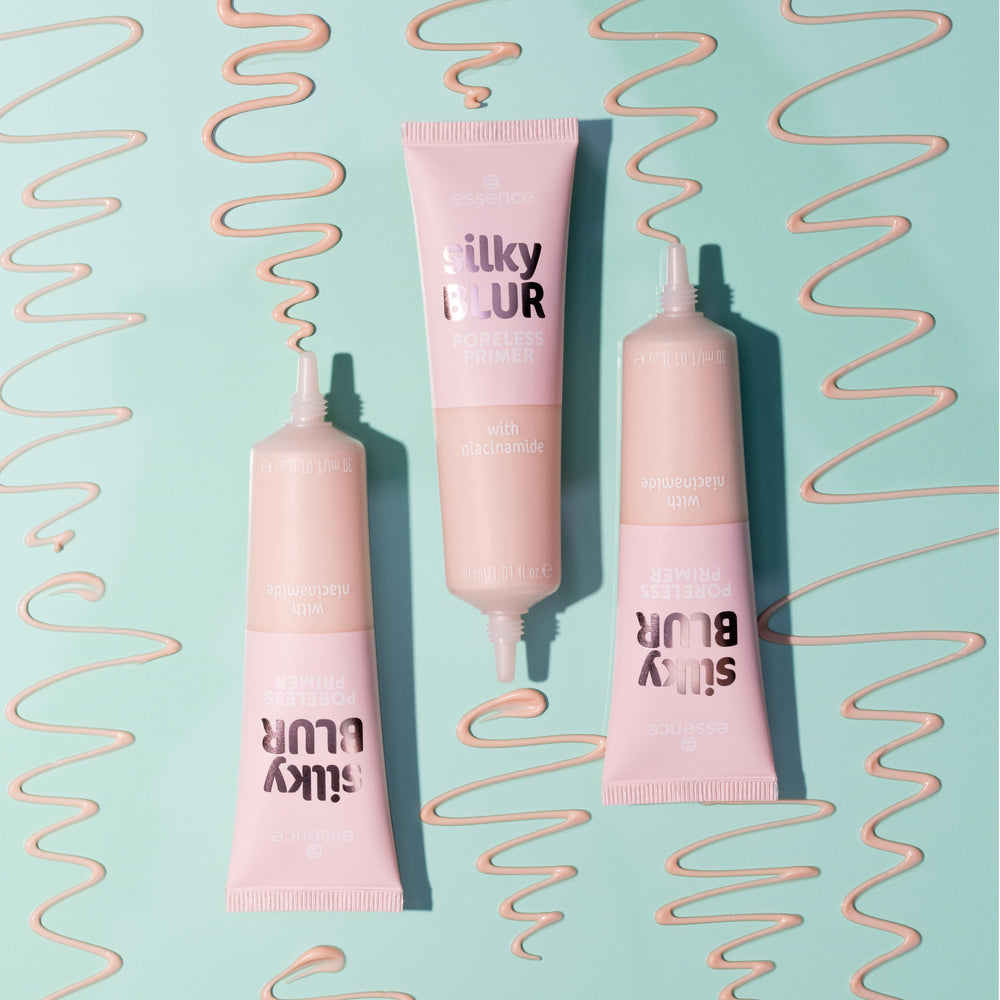 essence Silky Blur Primer compact shot implies portable base makeup.