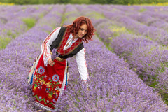Essentially KateS Lavender Salt Scrub pour action showing oil-rich texture for hydration.