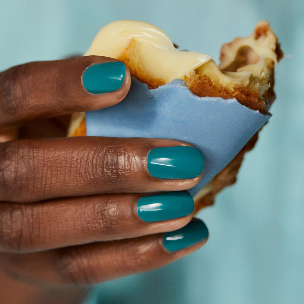 Essie Apricot Cuticle Oil provides nail care boost.