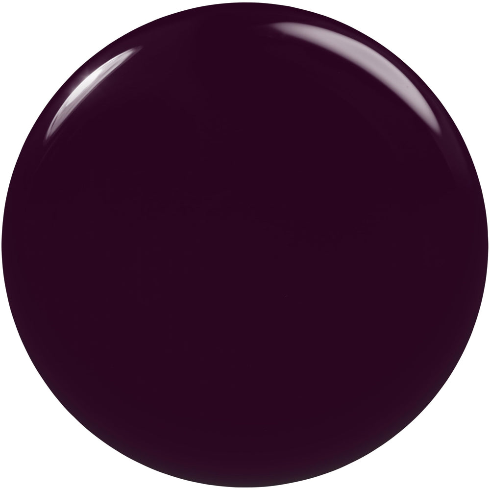 Brush stroke applying Essie Leather Weather purple for a smooth manicure.