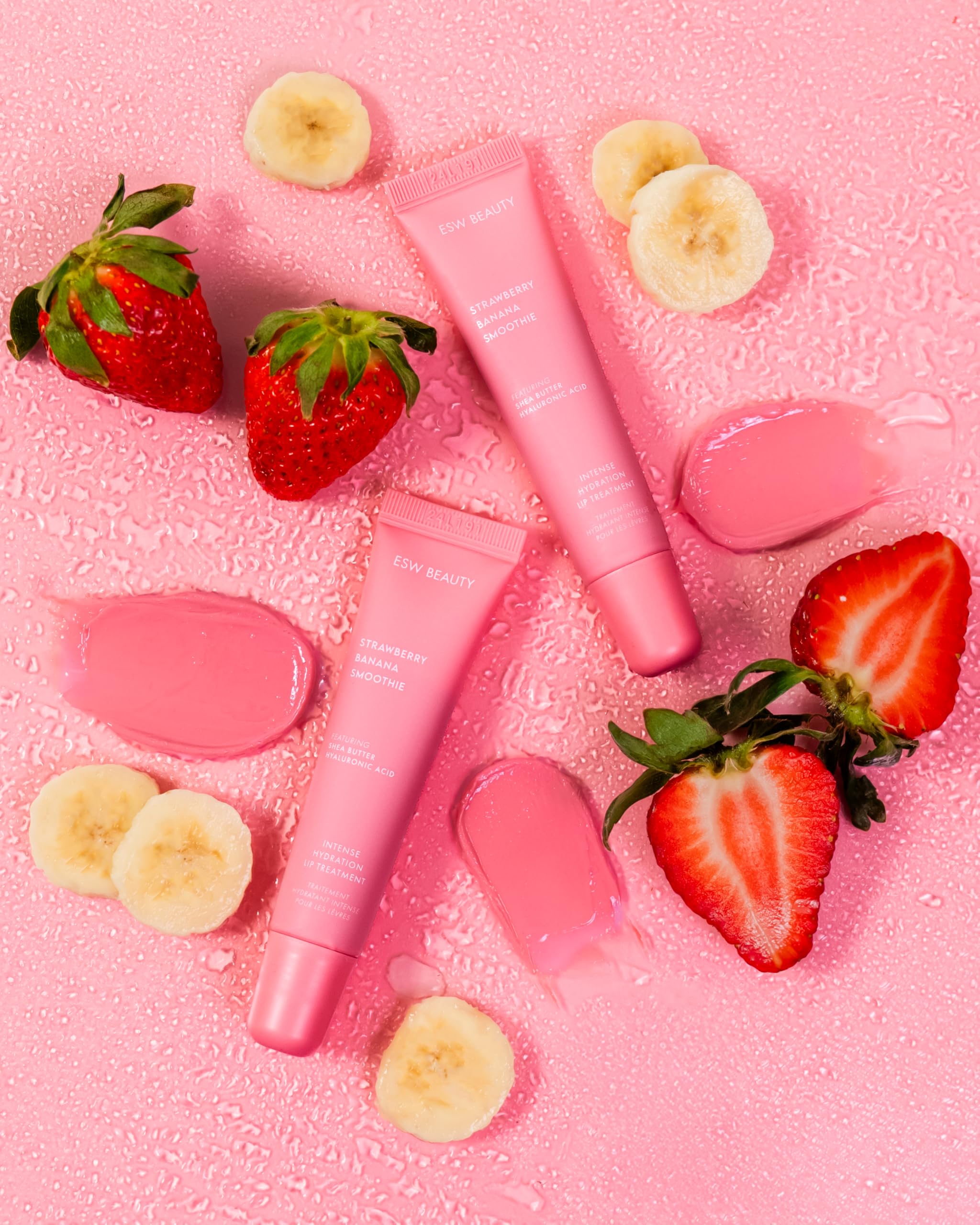ESW Beauty Strawberry Banana Smoothie Lip Treatment tube closeup highlighting moisturizing formula.