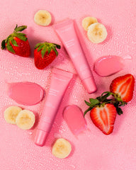 ESW Beauty Strawberry Banana Smoothie Lip Treatment tube closeup highlighting moisturizing formula.