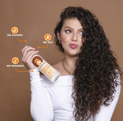 ETNIKER Curl Refresher Spray application helps redefine curls between wash days