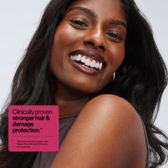 Eva NYC Repair Leave-In bottle being applied to damp hair mid-lengths to ends.