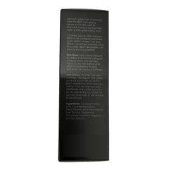 Serum being applied to wet hair with a few drops