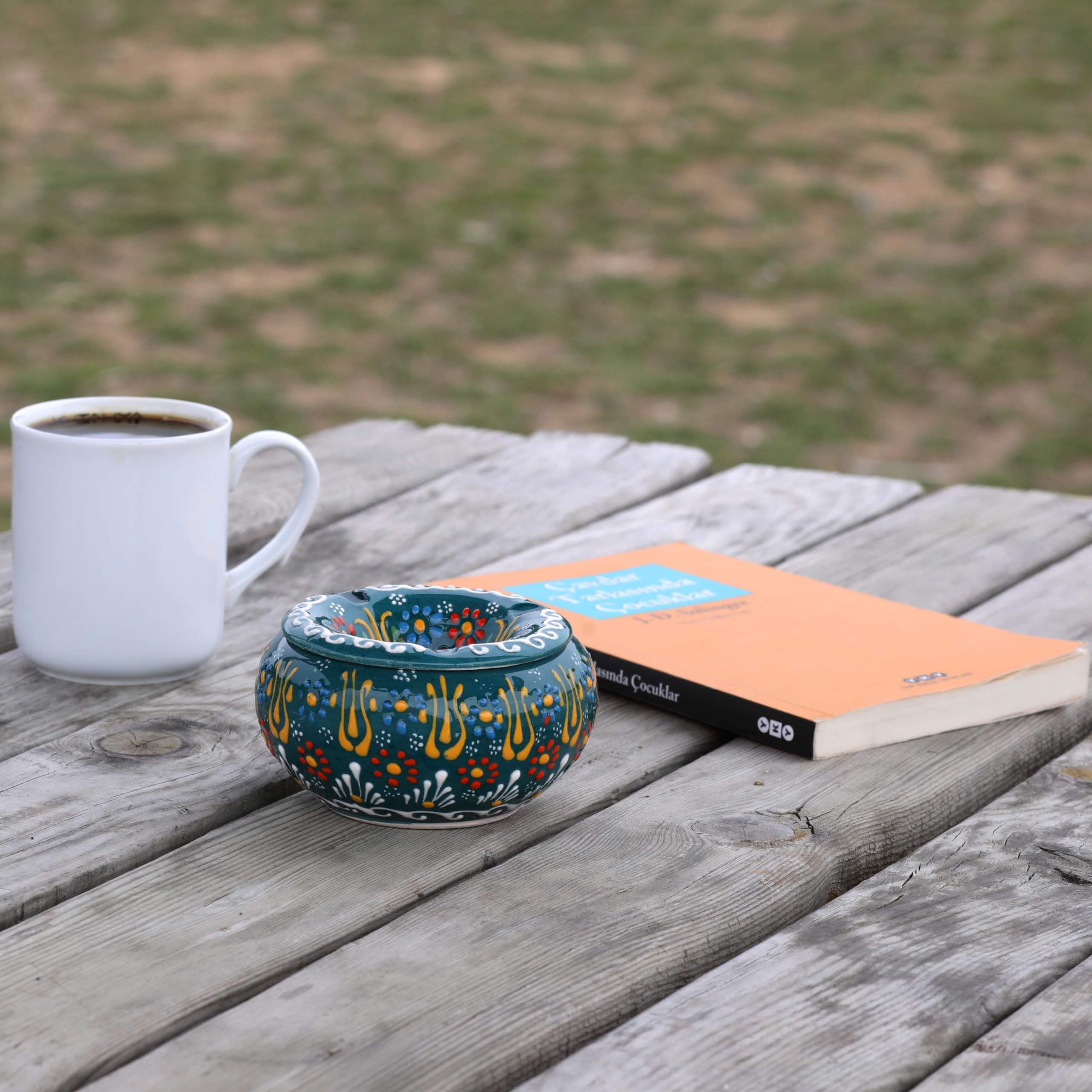 EVANILIFE handmade ceramic jar showcasing colorful patterns ideal for stylish organization