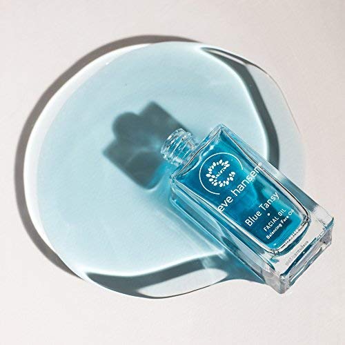 Eve Hansen Blue Tansy facial oil dropper close-up for daily nourishment.