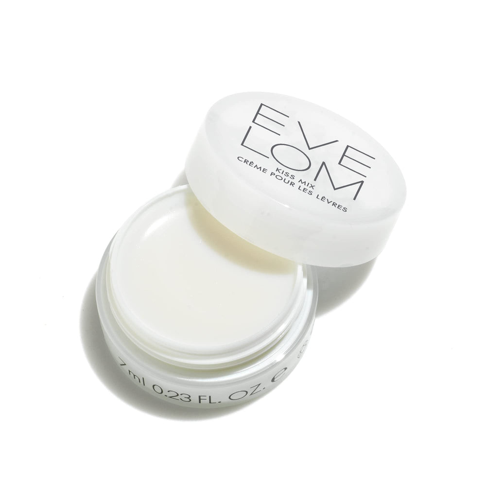 EVE LOM Kiss Mix lip balm during application showing smooth glide and long-lasting moisture.