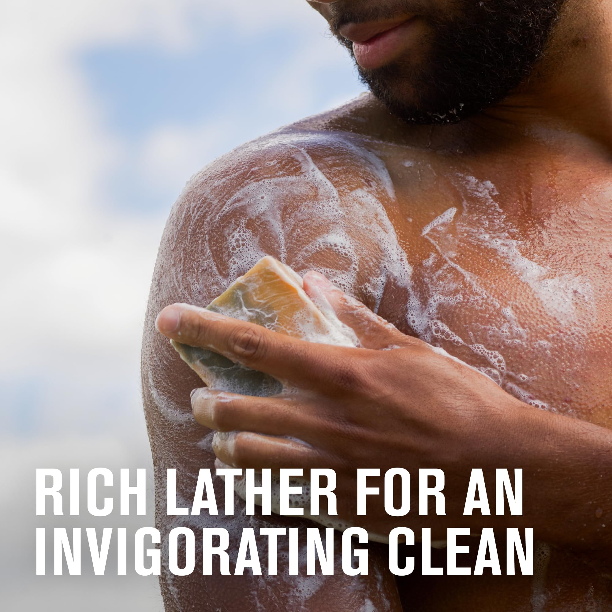 Every Man Jack soap bar wet in basin shows cleansing action and potential skin hydration.