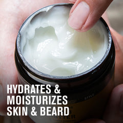 Hands applying Every Man Jack Beard Butter Vanilla Cedar to beard