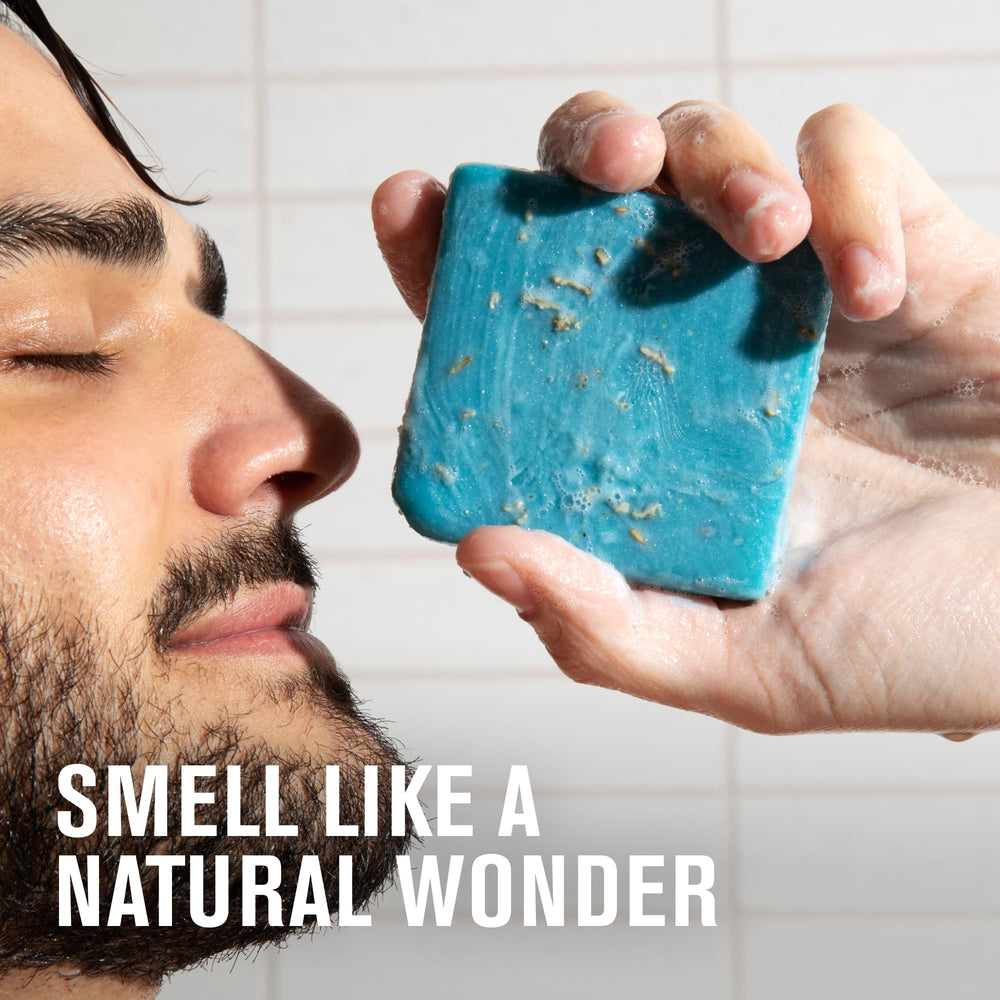 Tahoe Blue bottle photographed in shower, inspired by alpine landscapes.