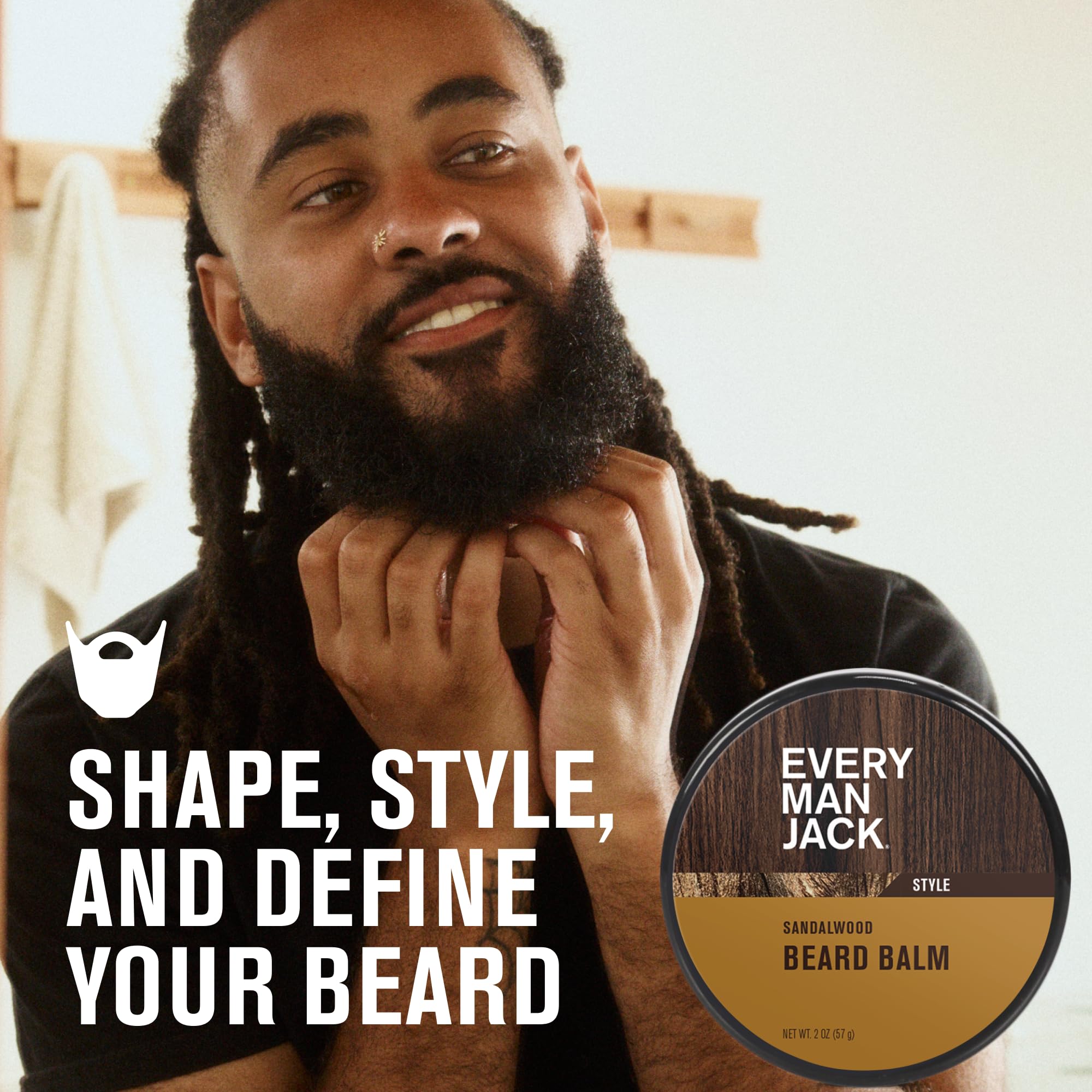 Applying Every Man Jack sandalwood beard balm with easy, medium-hold action.
