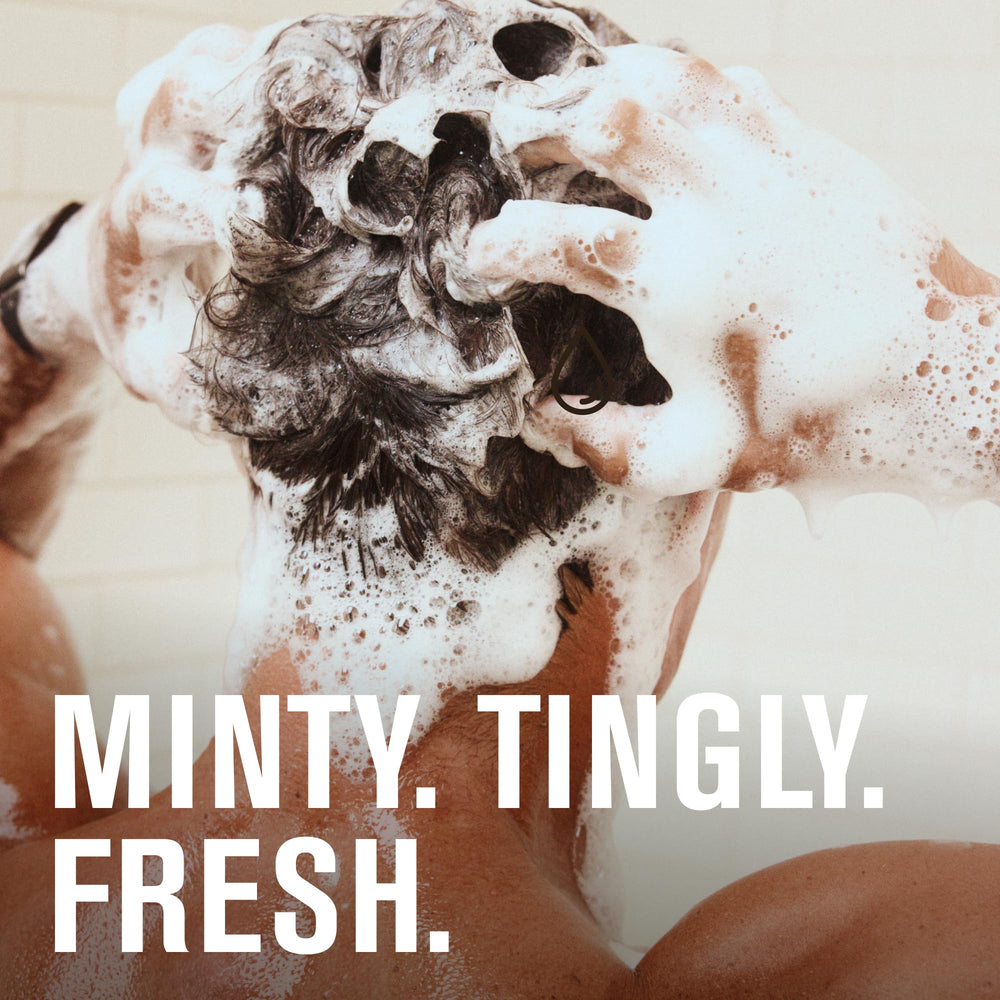 Every Man Jack shampoo closeup showing peppermint ingredient for cooling scalp sensation.