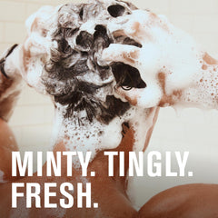 Every Man Jack shampoo closeup showing peppermint ingredient for cooling scalp sensation.