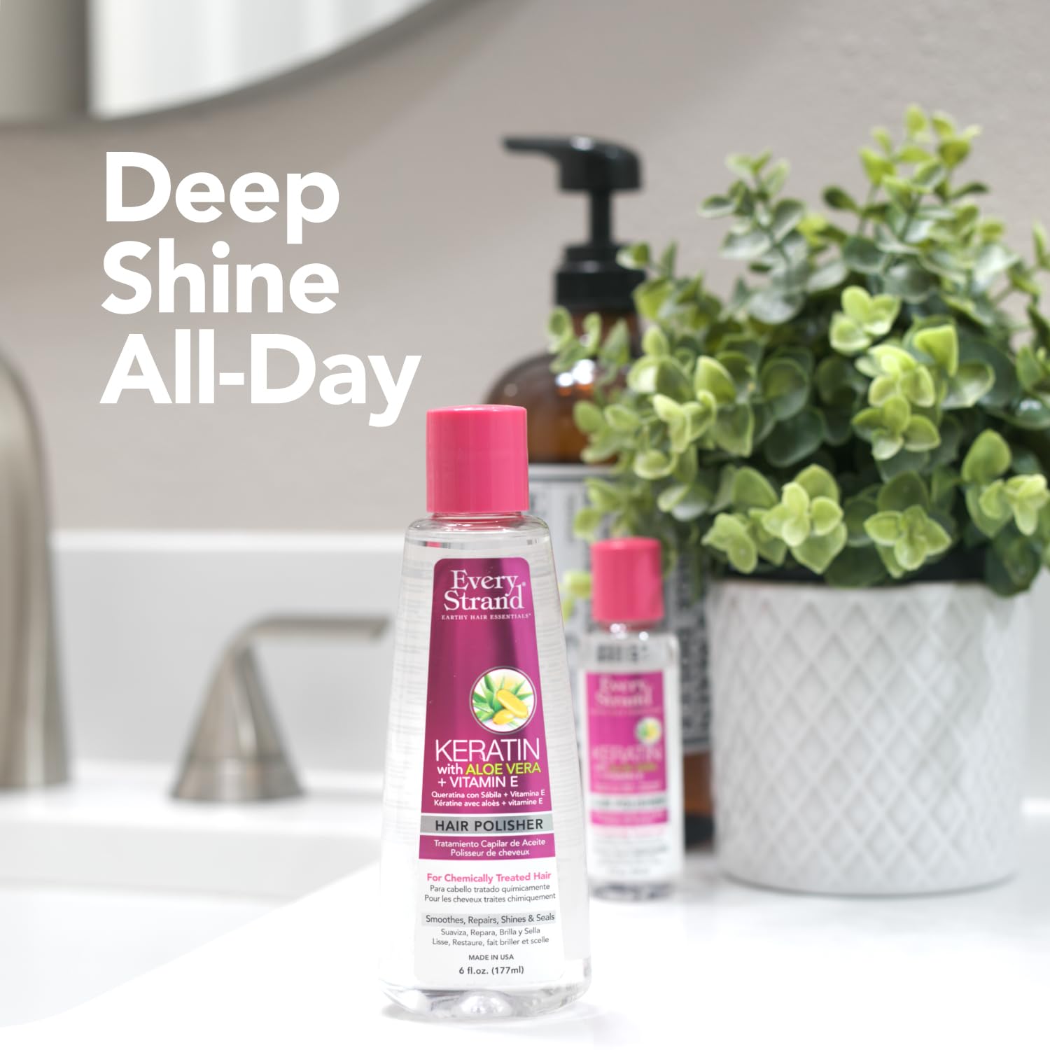 Every Strand product trio on a shelf conveys a complete keratin care routine.