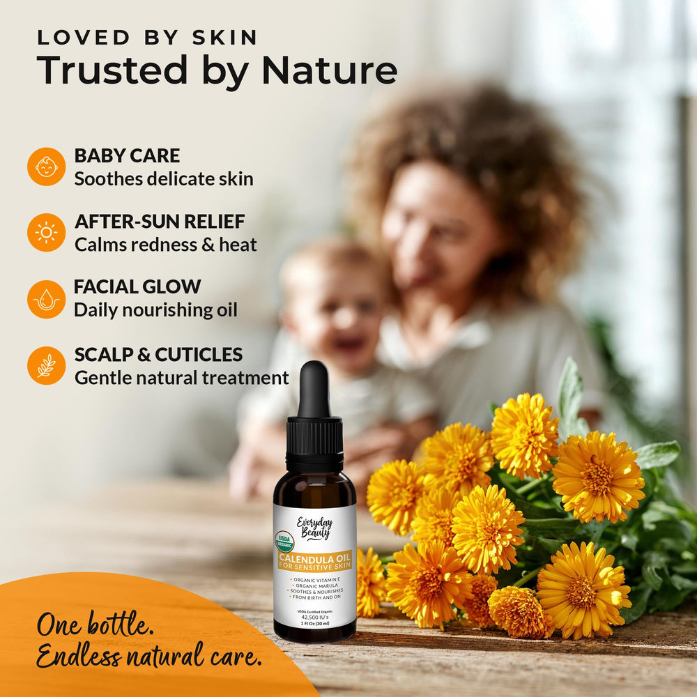 Everyday Beauty calendula oil massaged into hands for moisturization