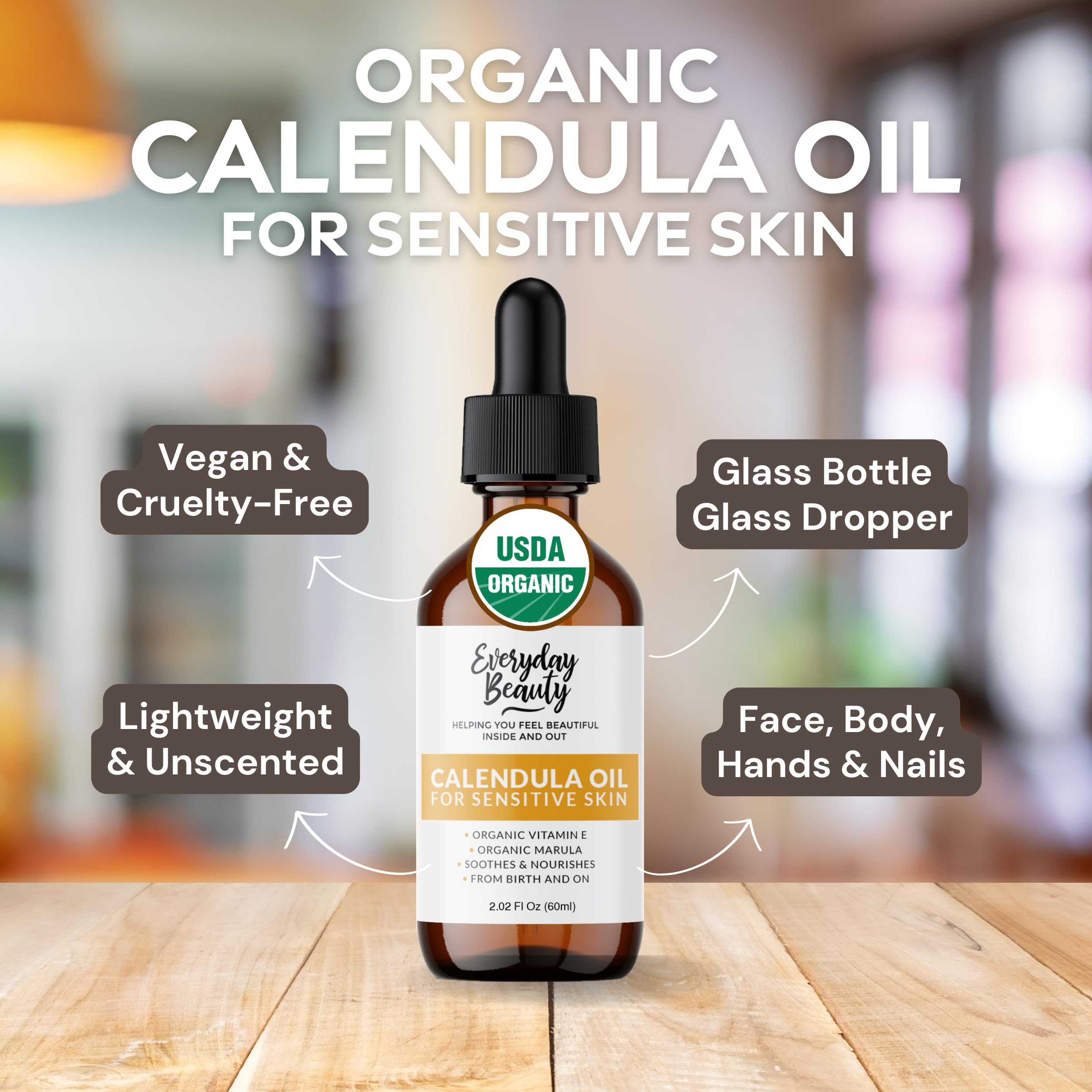 Everyday Beauty Calendula Oil applied to hands for gentle moisturization.