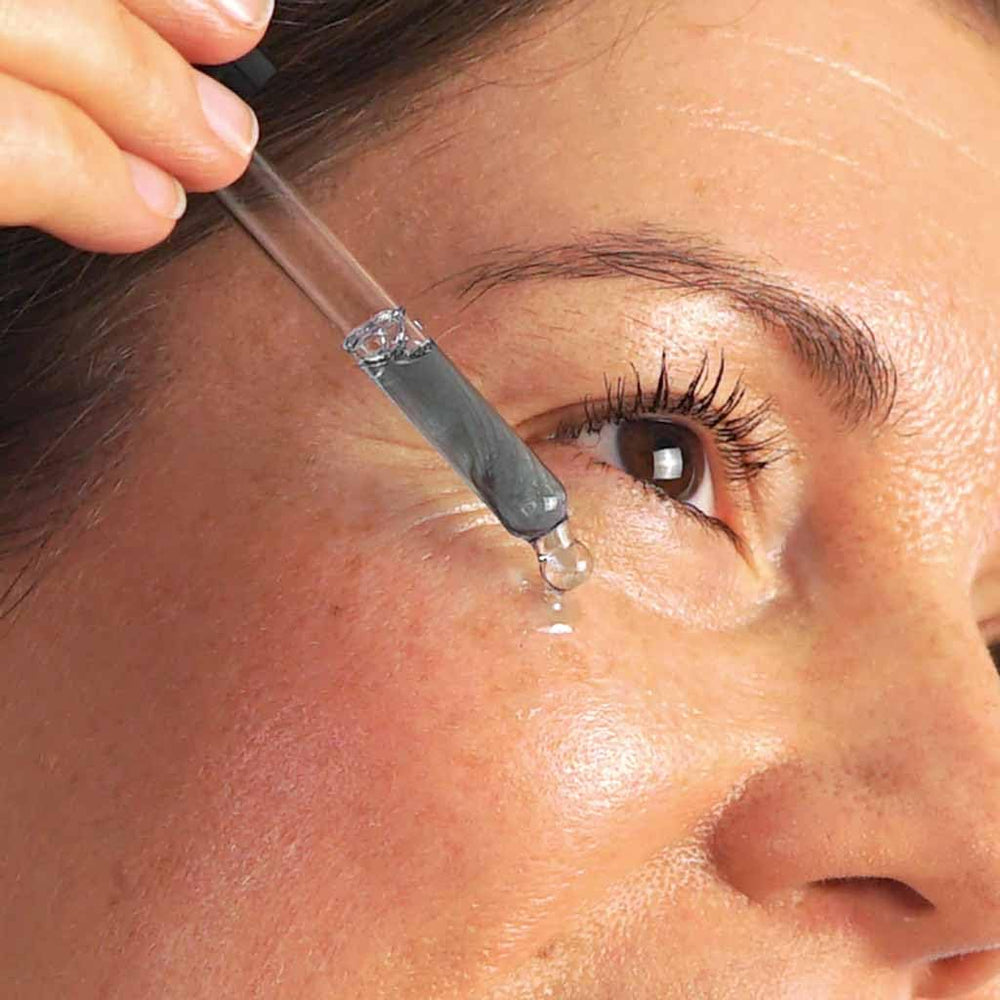 Evolve Blue Velvet Ceramide Serum dropper, easy daily application.