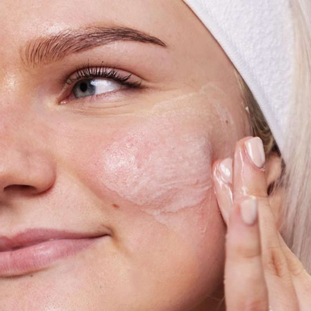 Foam close-up of Evolve Daily Detox Wash showing refreshing cleanse for pores.