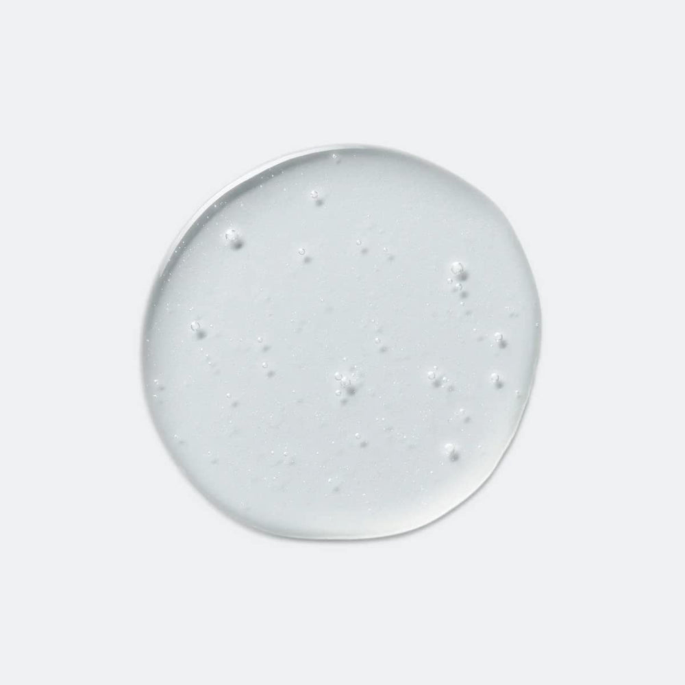 EVOLVh UltraShine Moisture Shampoo close-up highlights radiant shine and smoothing.