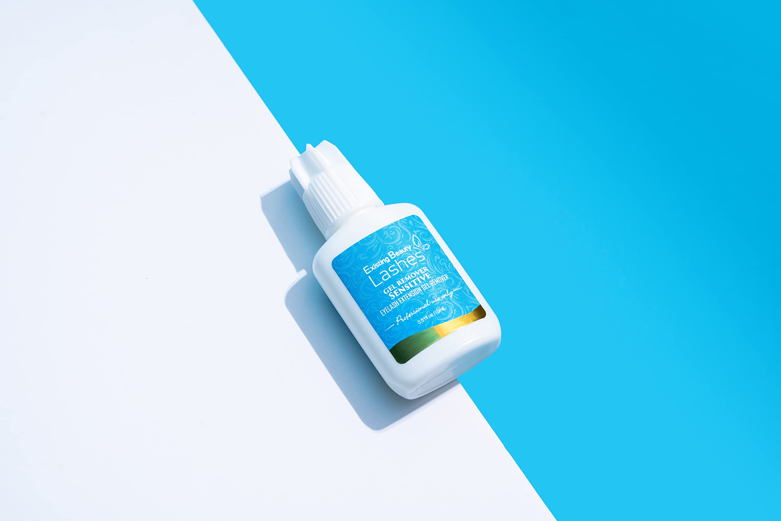 Existing Beauty lash remover bottle with label and home-use illustration.