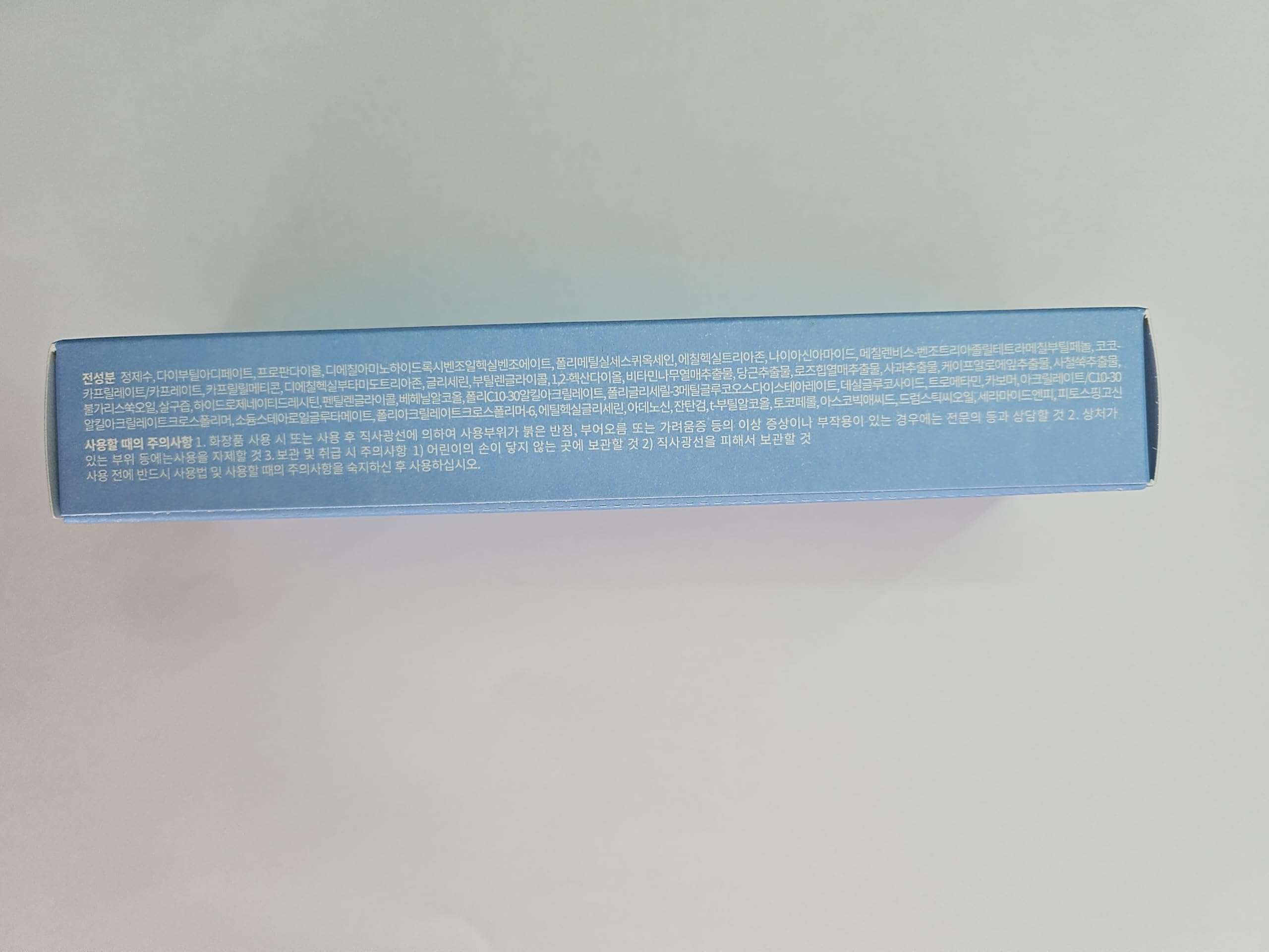 Compact packaging of Face Republic Purity Sun Essence suitable for travel