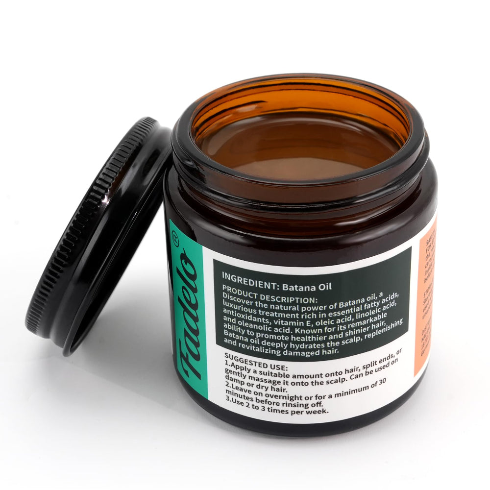 Close-up of Fadelo Batana oil highlighting pure, unrefined texture for frizz control