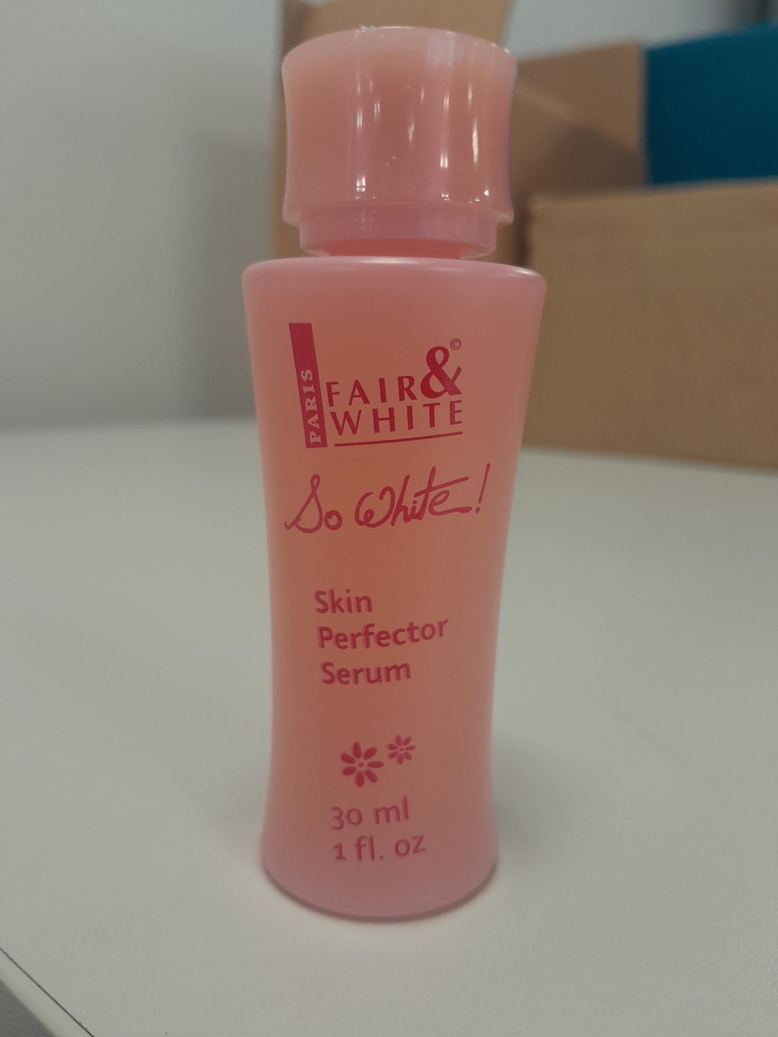 FAIR & WHITE So White serum glow close-up emphasizes radiance and clarity.