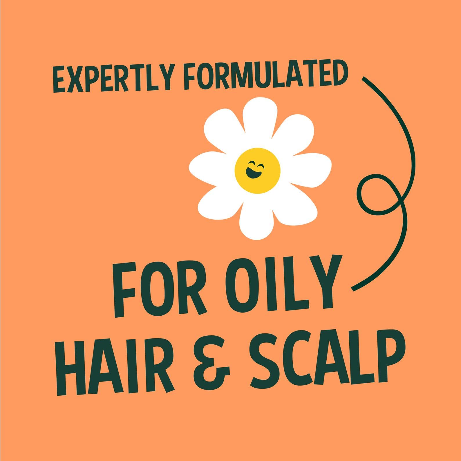 Hands applying conditioner in shower for smooth, manageable hair