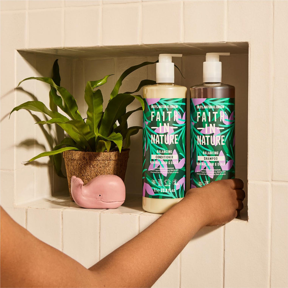 Faith in Nature family-sized bottle on bathroom shelf indicating generous capacity.