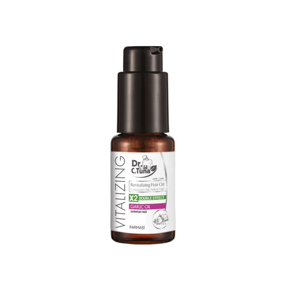 FARMASi Dr. C. Tuna Garlic Oil bottle ready for scalp nourishment.