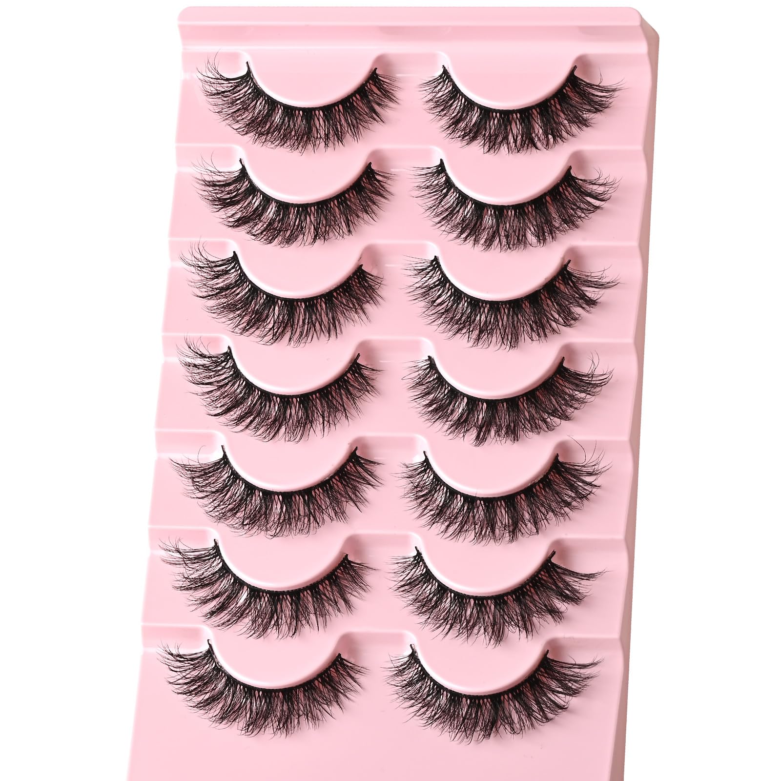 FARRED short fluffy strip lashes create outer elongation for a cat-eye look.
