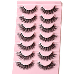FARRED short fluffy strip lashes create outer elongation for a cat-eye look.
