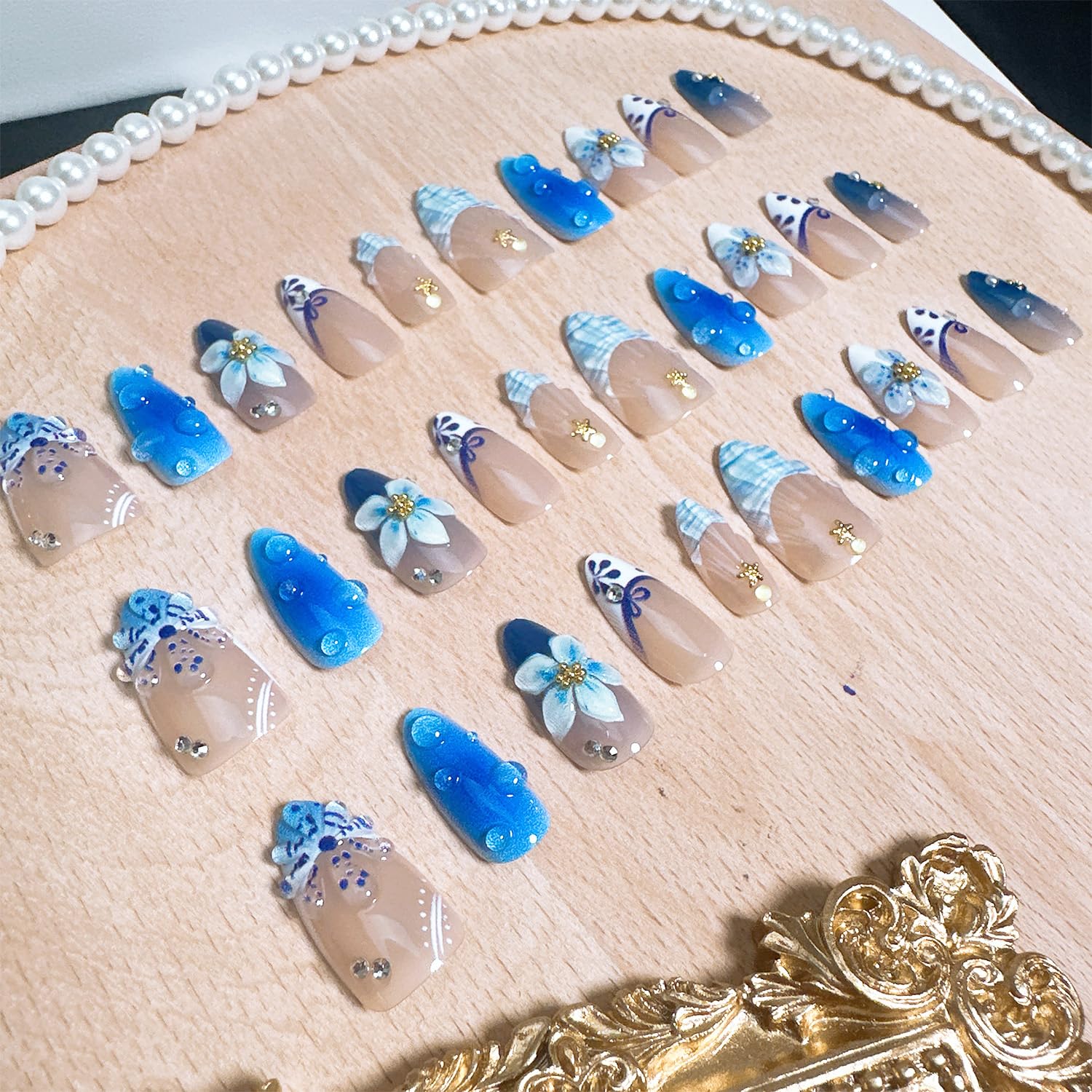 FDSQHSA blue flower French tip press-ons for stylish wedding or party looks.