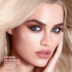 FeiCuiYun pink honey tinted lip balm swirl highlights creamy texture for smooth lips.
