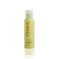 Fekkai Brilliant Gloss Shampoo bottle closeup showing sleek packaging and shine boost